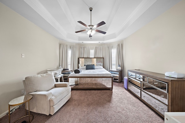 3627 Grand Promenade Ln, Stafford, TX 77477 - carpeted bedroom featuring a tray ceiling, ornamental molding, and a ceiling fan