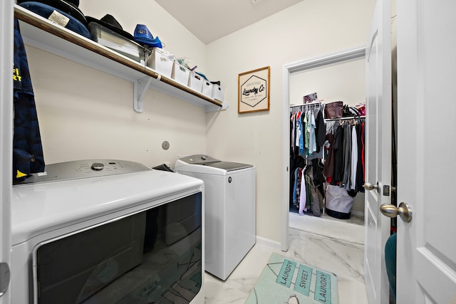 3627 Grand Promenade Ln, Stafford, TX 77477 - laundry area featuring light marble finish floors and separate washer and dryer