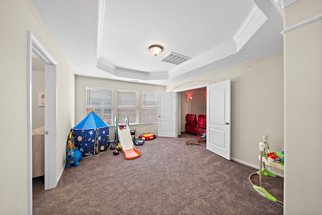 3627 Grand Promenade Ln, Stafford, TX 77477 - playroom featuring a raised ceiling, crown molding, carpet flooring, and baseboards