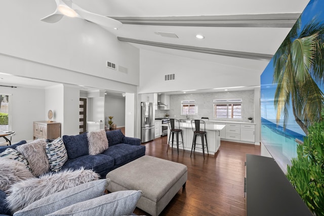 3531 Westridge St, Houston, TX 77025 - living area featuring dark wood finished floors, ceiling fan, beamed ceiling, recessed lighting, and high vaulted ceiling