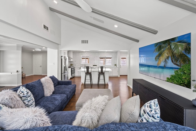 3531 Westridge St, Houston, TX 77025 - living area featuring recessed lighting, beam ceiling, baseboards, dark wood-style flooring, and high vaulted ceiling
