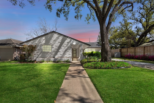 3531 Westridge St, Houston, TX 77025 - mid-century modern home with an attached garage and brick siding