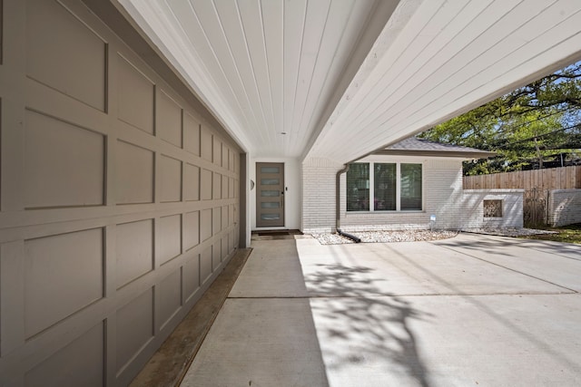 3531 Westridge St, Houston, TX 77025 - entrance to property featuring brick siding, fence, and a patio area
