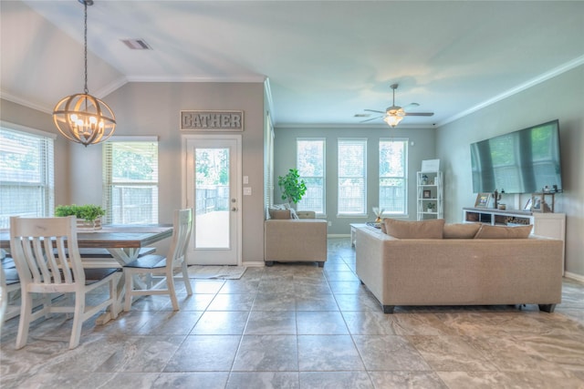 2255 Golden Laurel Dr, Conroe, TX 77304 - living area with ornamental molding, a chandelier, baseboards, a ceiling fan, and lofted ceiling