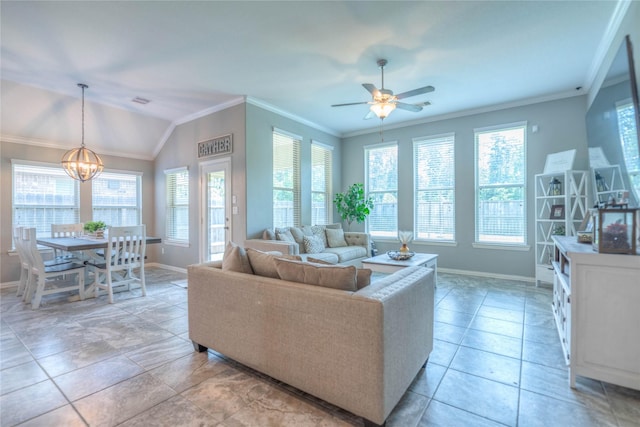 2255 Golden Laurel Dr, Conroe, TX 77304 - living area featuring baseboards, plenty of natural light, ornamental molding, and vaulted ceiling