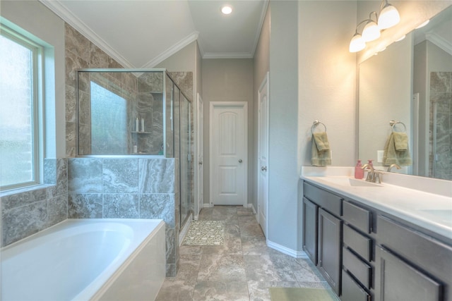 2255 Golden Laurel Dr, Conroe, TX 77304 - full bathroom featuring a garden tub, a stall shower, ornamental molding, double vanity, and baseboards
