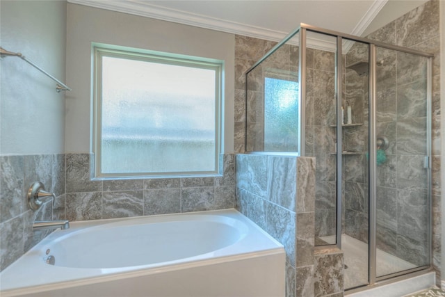 2255 Golden Laurel Dr, Conroe, TX 77304 - bathroom with a stall shower, plenty of natural light, a bath, and ornamental molding