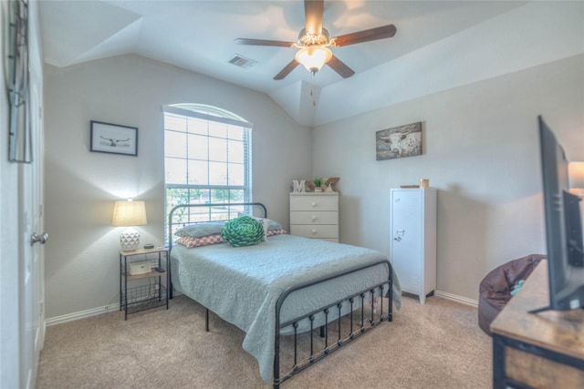 2255 Golden Laurel Dr, Conroe, TX 77304 - carpeted bedroom featuring lofted ceiling, baseboards, and a ceiling fan