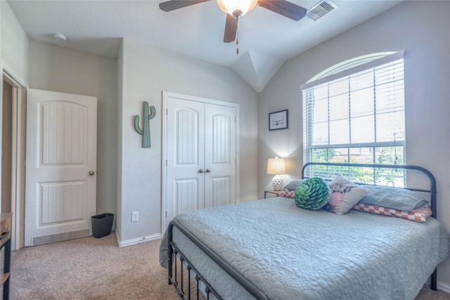 2255 Golden Laurel Dr, Conroe, TX 77304 - bedroom with multiple windows, a closet, carpet, and ceiling fan