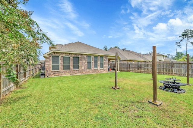 2255 Golden Laurel Dr, Conroe, TX 77304 - rear view of property with brick siding and roof with shingles
