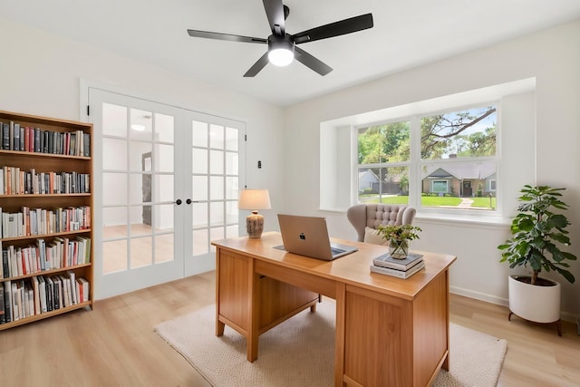 2610 Moss Hill Dr, Houston, TX 77080 - office featuring french doors, light wood-style flooring, ceiling fan, and baseboards