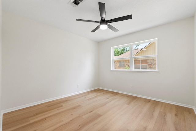 2610 Moss Hill Dr, Houston, TX 77080 - empty room featuring light wood finished floors, baseboards, and ceiling fan