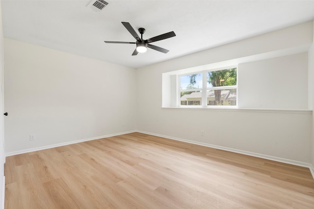 2610 Moss Hill Dr, Houston, TX 77080 - spare room featuring light wood finished floors, baseboards, and a ceiling fan