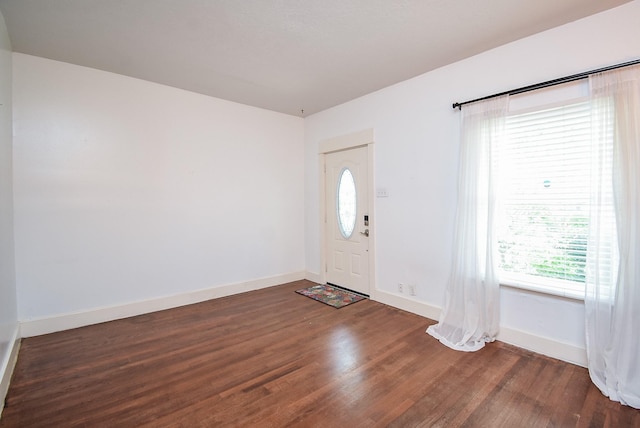 117 E 25th St, Houston, TX 77008 - entrance foyer featuring wood finished floors, plenty of natural light, and baseboards