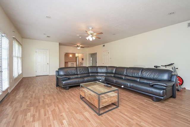 117 E 25th St, Houston, TX 77008 - living area with light wood-style flooring and ceiling fan