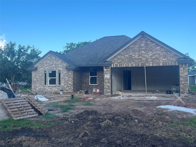 52 Leeder Ct, Lake Jackson, TX 77566 - ranch-style house with brick siding and roof with shingles