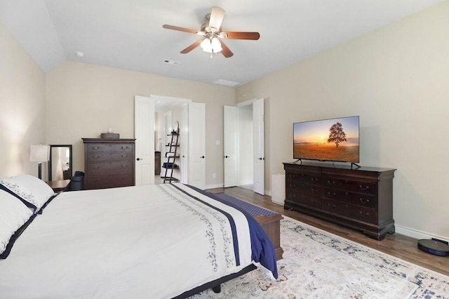 266 Overland Trce, Montgomery, TX 77316 - bedroom featuring wood finished floors, baseboards, and ceiling fan