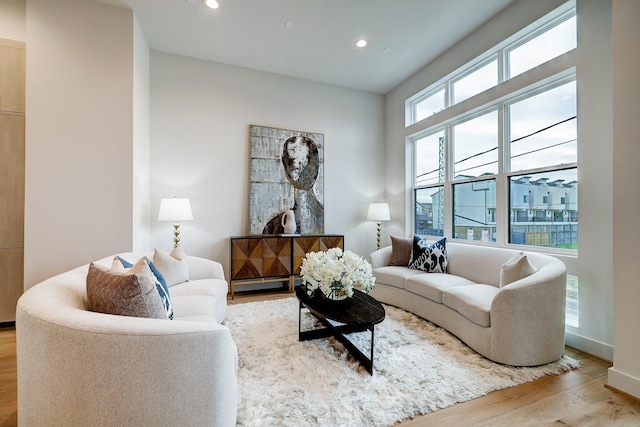 2105 Emancipation Ave, Houston, TX 77003 - living area featuring wood finished floors and recessed lighting