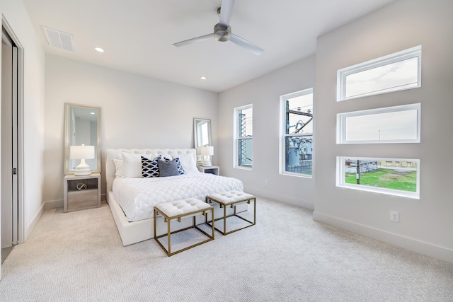 2105 Emancipation Ave, Houston, TX 77003 - bedroom with light carpet, baseboards, recessed lighting, and ceiling fan