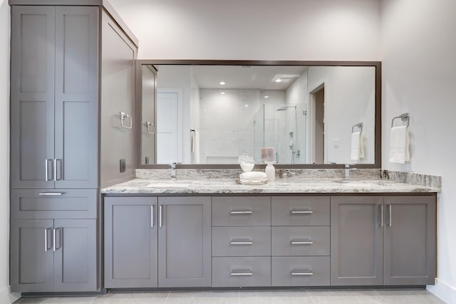 2105 Emancipation Ave, Houston, TX 77003 - full bathroom featuring a stall shower and double vanity