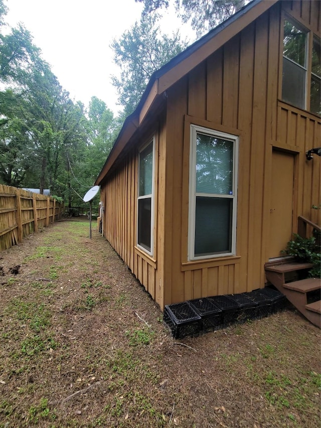 20 Shannon St, Huntsville, TX 77320 - view of home's exterior with board and batten siding