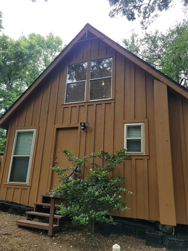 20 Shannon St, Huntsville, TX 77320 - view of home's exterior with board and batten siding