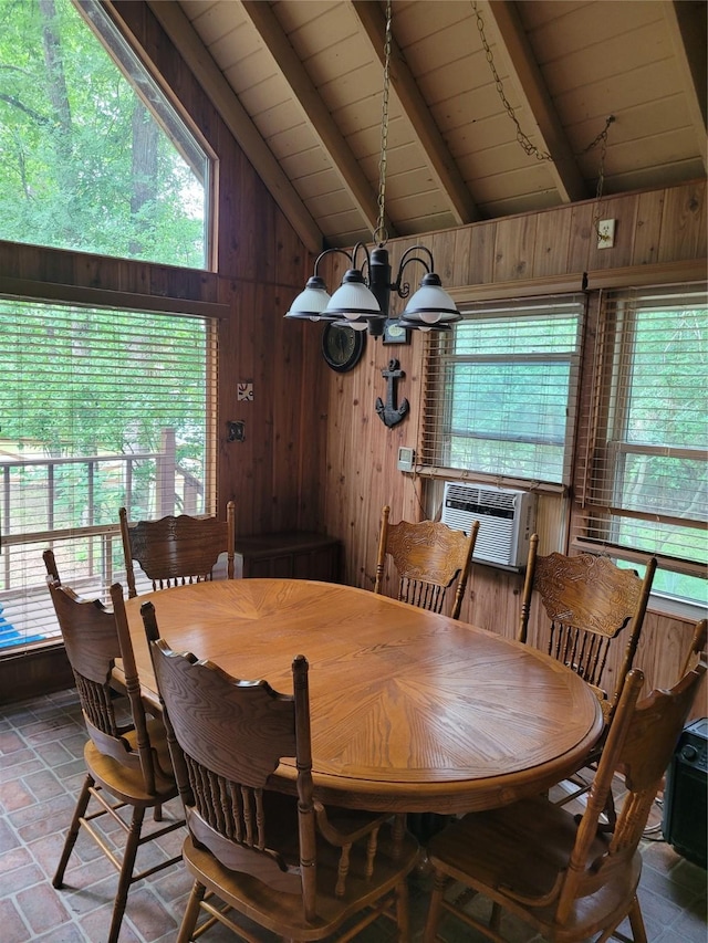 20 Shannon St, Huntsville, TX 77320 - dining area with wooden ceiling, a chandelier, wood walls, and cooling unit