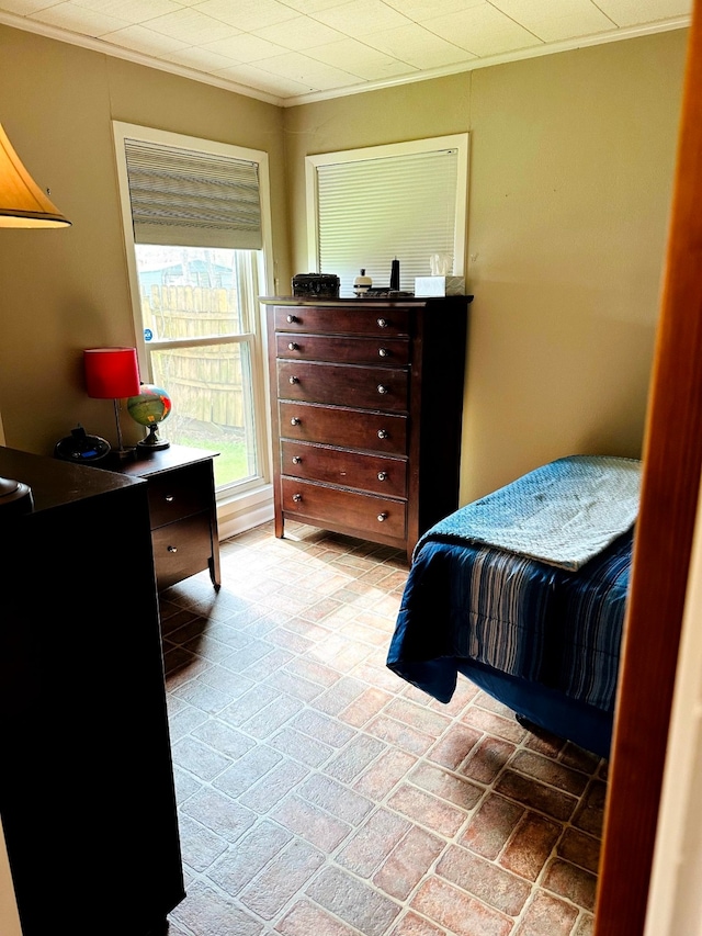 20 Shannon St, Huntsville, TX 77320 - bedroom with crown molding and a desk
