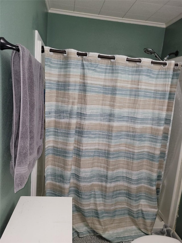 20 Shannon St, Huntsville, TX 77320 - bathroom with a shower with curtain and ornamental molding