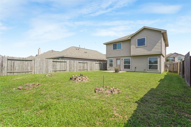 2806 Old Draw Dr, Humble, TX 77396 - back of property featuring a fire pit