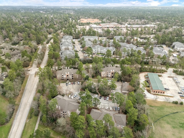 8051 Bay Branch Dr Unit 324, The Woodlands, TX 77382 - aerial view of property's location featuring nearby suburban area and a forest