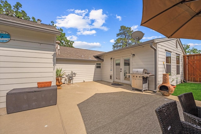 3003 Randall St, Houston, TX 77018 - view of patio featuring a grill, fence, and french doors