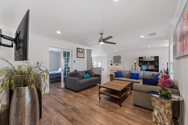 3003 Randall St, Houston, TX 77018 - living room with crown molding, a ceiling fan, wood finished floors, recessed lighting, and french doors