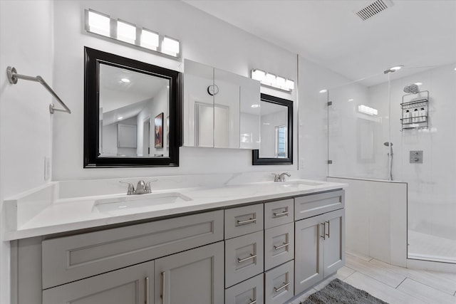 3003 Randall St, Houston, TX 77018 - bathroom featuring a stall shower and double vanity