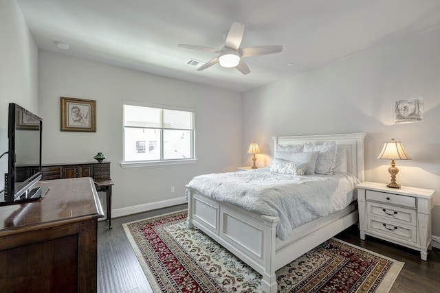 3604 Dorset Cliff Ln, Houston, TX 77055 - bedroom with dark wood finished floors, baseboards, and ceiling fan