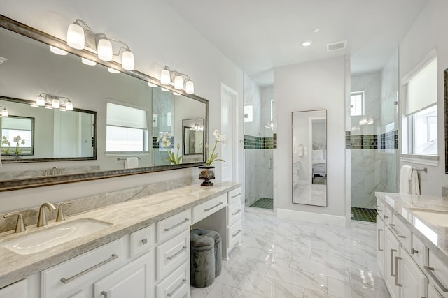 3604 Dorset Cliff Ln, Houston, TX 77055 - full bath featuring healthy amount of natural light, a stall shower, marble finish floors, vanity, and recessed lighting