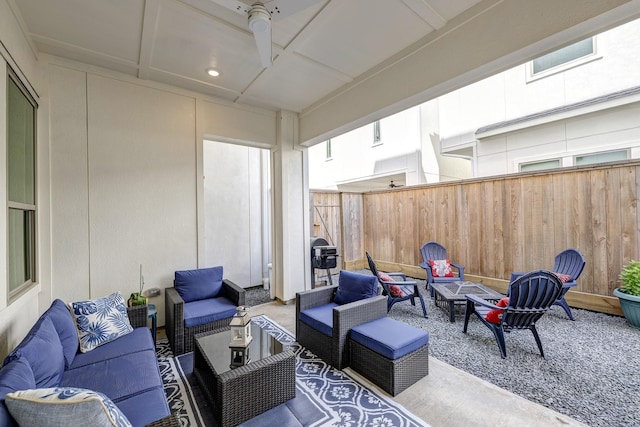 3604 Dorset Cliff Ln, Houston, TX 77055 - fenced backyard featuring an outdoor living space with a fire pit, a patio, ceiling fan, and grilling area