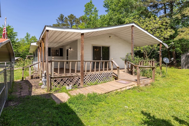 126 Cris Rd, Lufkin, TX 75901 - view of front facade with a wooden deck