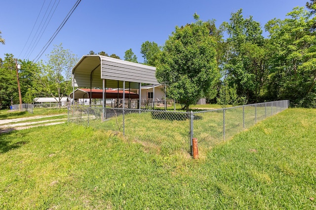 126 Cris Rd, Lufkin, TX 75901 - view of yard with a carport