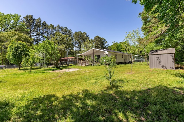 126 Cris Rd, Lufkin, TX 75901 - view of yard with a storage shed and an outbuilding