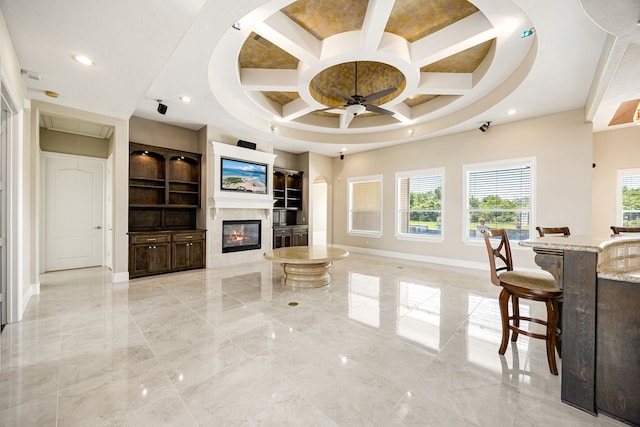 2119 Red Bird Ln, Brookshire, TX 77423 - living area featuring attic access, a ceiling fan, coffered ceiling, baseboards, and light marble finish floors