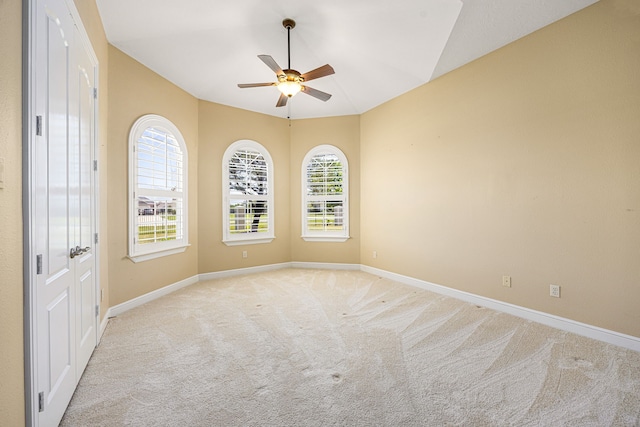2119 Red Bird Ln, Brookshire, TX 77423 - empty room with light colored carpet, a ceiling fan, and baseboards