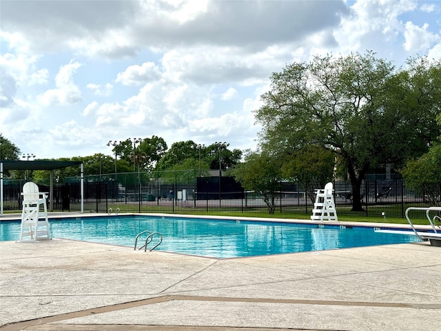 9630 E Withers Way Cir, Houston, TX 77065 - community pool featuring a patio area and fence