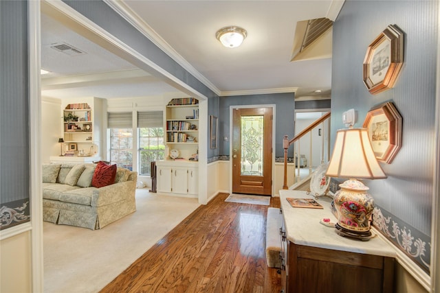 5410 Coral Ridge Rd, Houston, TX 77069 - entryway with ornamental molding, wood finished floors, and baseboards