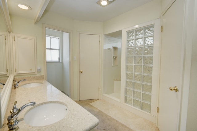 5410 Coral Ridge Rd, Houston, TX 77069 - full bath with double vanity, a walk in shower, and tile patterned flooring