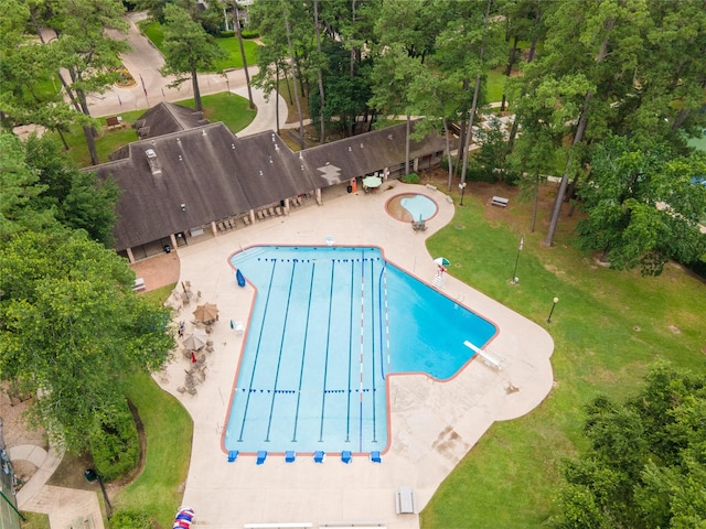 5410 Coral Ridge Rd, Houston, TX 77069 - community pool featuring a diving board, a patio, and a yard
