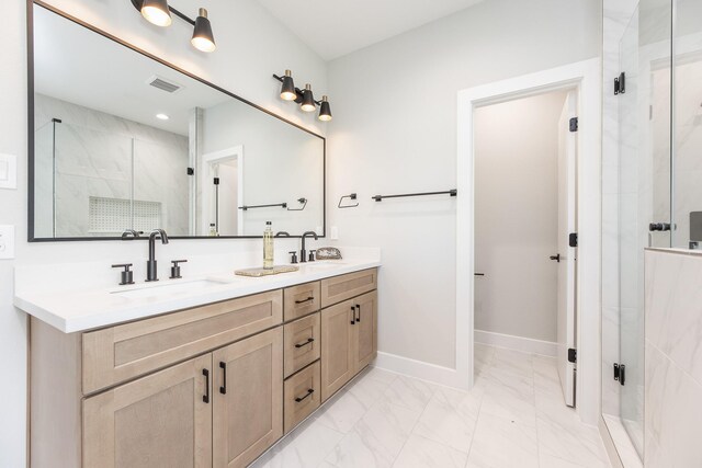 3312 Bremond St, Houston, TX 77004 - full bathroom with a shower stall, marble look tiles, double vanity, and baseboards