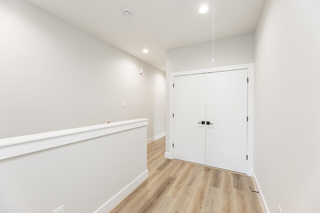 3312 Bremond St, Houston, TX 77004 - hallway featuring light wood-style floors, recessed lighting, and baseboards
