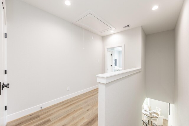 3312 Bremond St, Houston, TX 77004 - corridor with attic access, recessed lighting, light wood finished floors, and baseboards