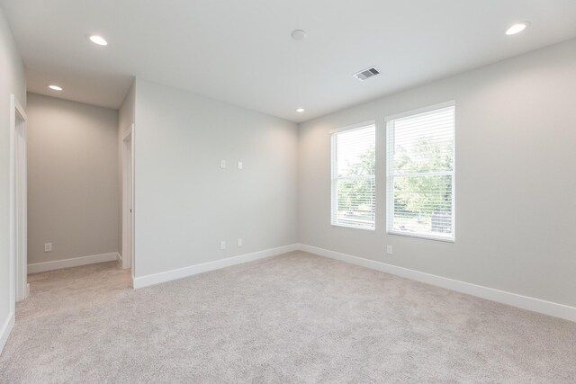 3312 Bremond St, Houston, TX 77004 - empty room featuring recessed lighting, light colored carpet, and baseboards